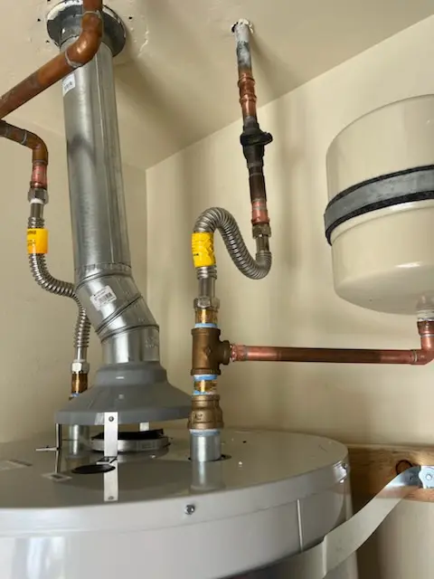 Water heater installation and plumbing repair in Forest Glade